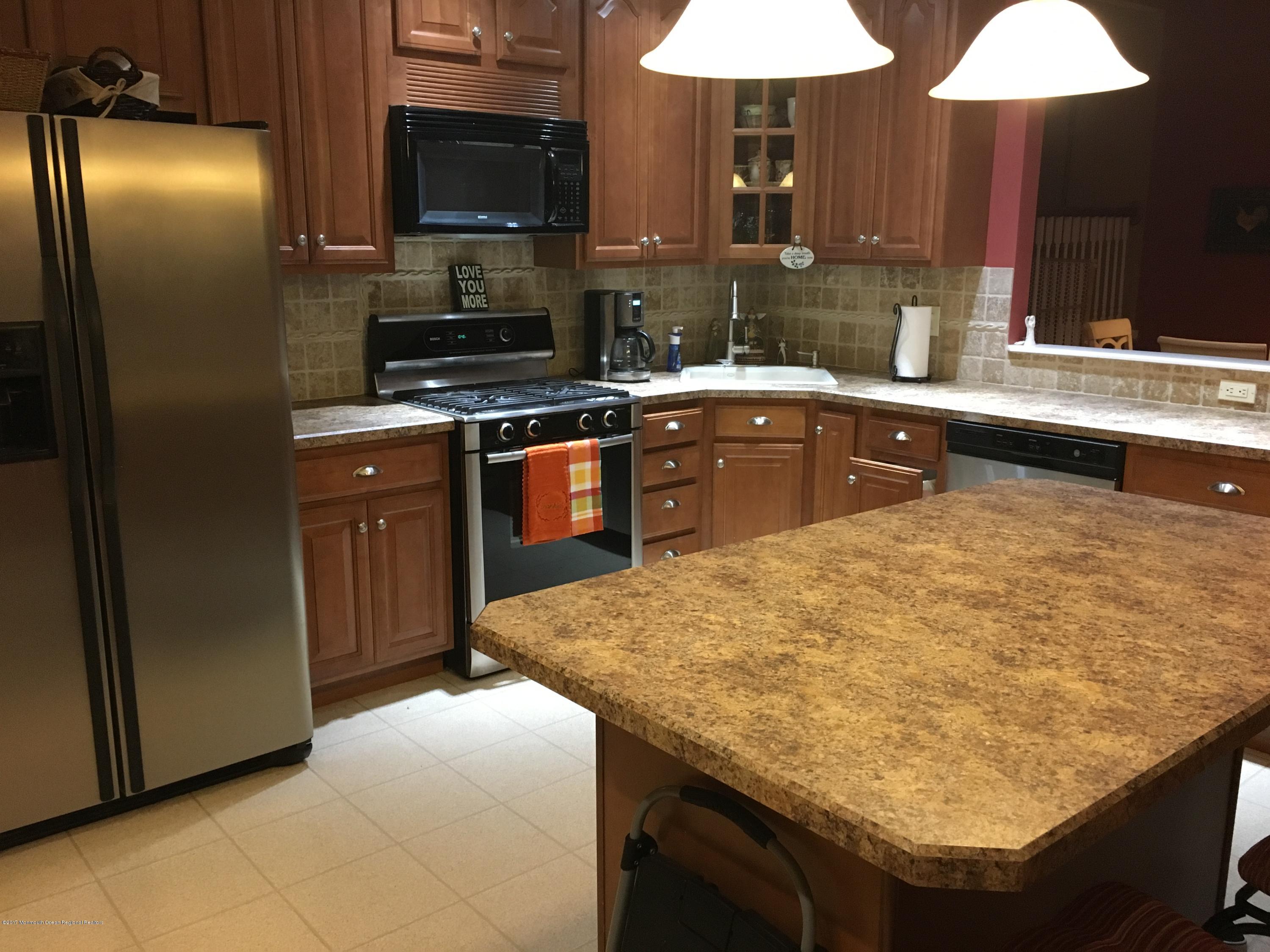 65 Wellington Road Freehold, NJ 07728 - Photo 2 of 12 41D7A0D4-6B12-449D-9344-38E79E9E81B2