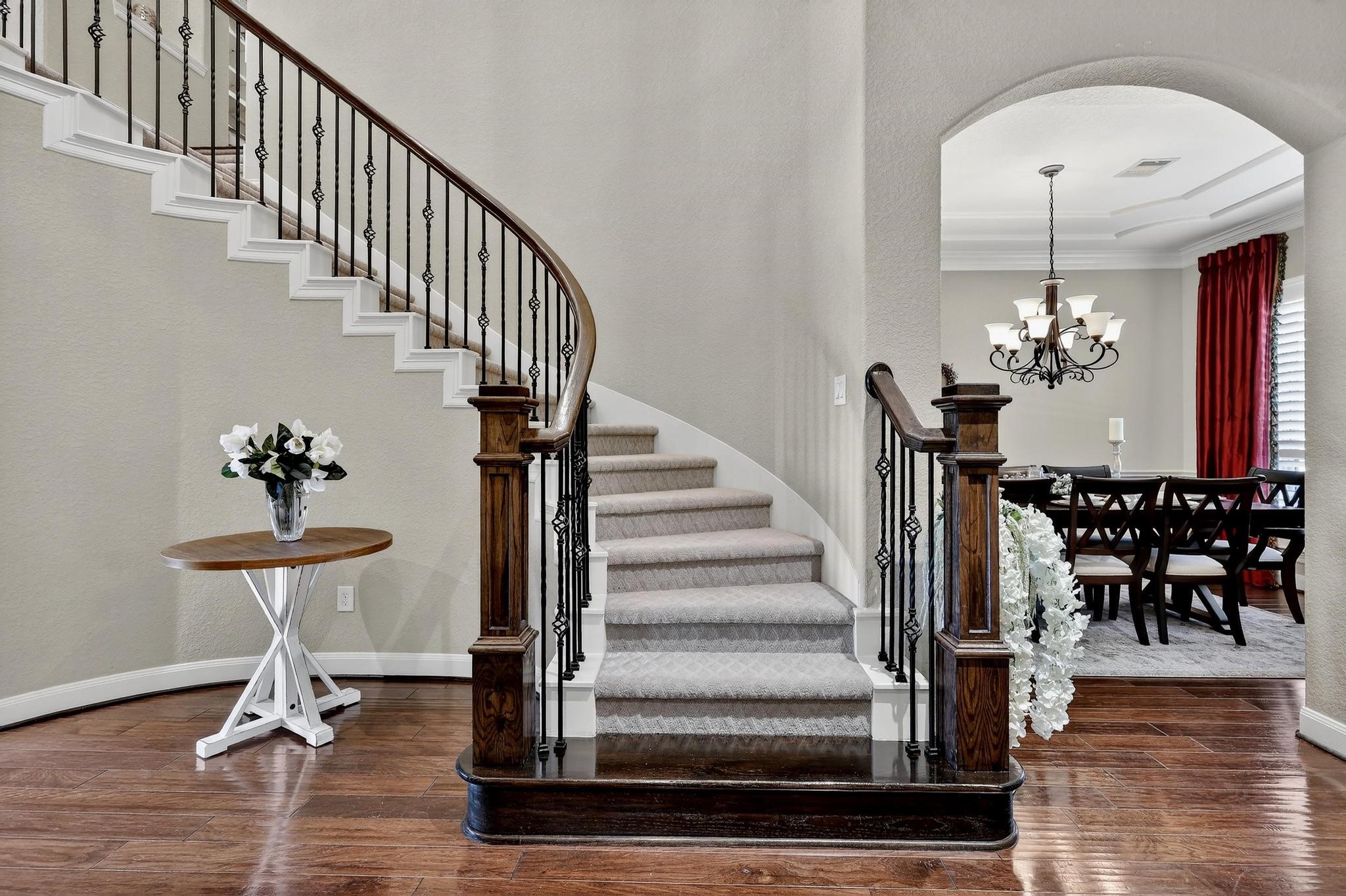 25803 Heritage Maple Drive Spring, TX 77389 - Photo 10 of 46 a view of a hallway with wooden floor and staircase