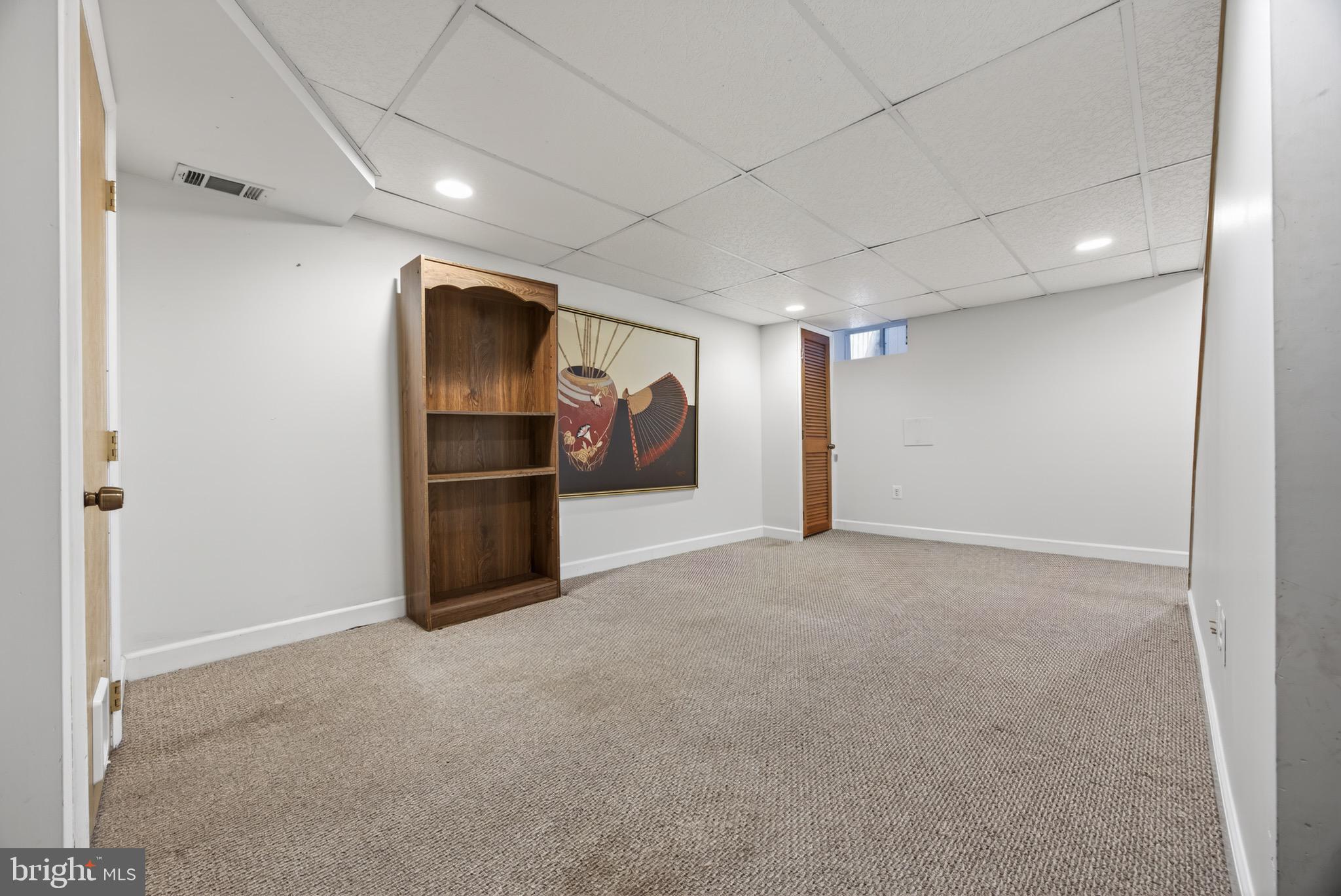 3579 Benzinger Road Baltimore, MD 21229 - Photo 28 of 34 a view of an empty room with a kitchen