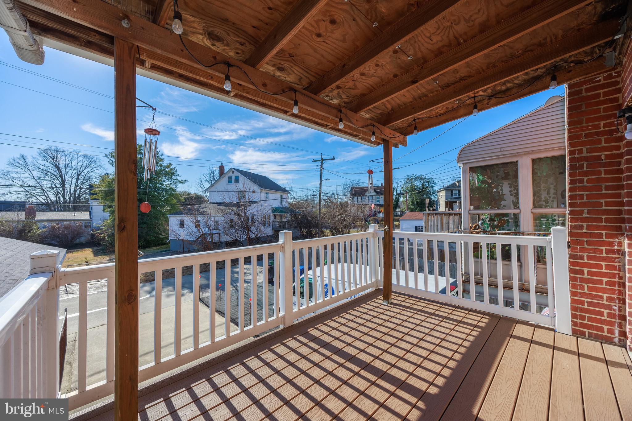 3579 Benzinger Road Baltimore, MD 21229 - Photo 32 of 34 a view of a balcony with wooden floor