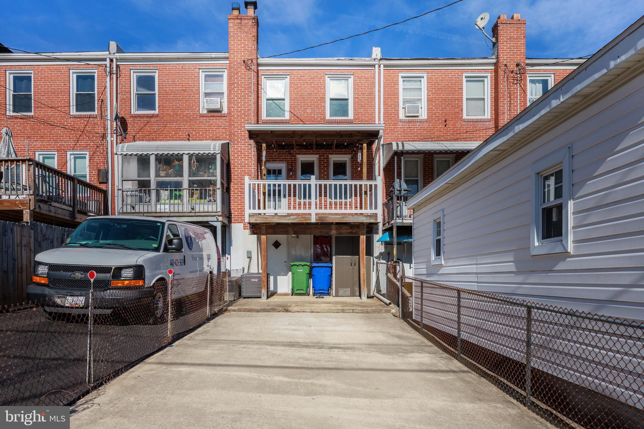 3579 Benzinger Road Baltimore, MD 21229 - Photo 34 of 34 a view of a building with car parked