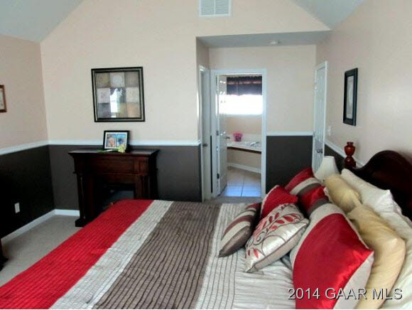 81 Sir Robin Road Waynesboro, VA 22980 - Photo 12 of 25 a bedroom with a bed and a desk