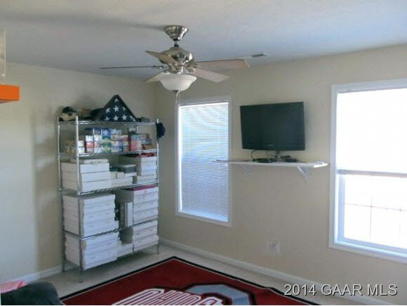 81 Sir Robin Road Waynesboro, VA 22980 - Photo 19 of 25 a view of a workspace with a flat screen tv