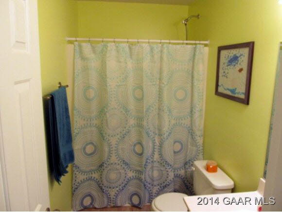 81 Sir Robin Road Waynesboro, VA 22980 - Photo 20 of 25 a bathroom with a shower and toilet