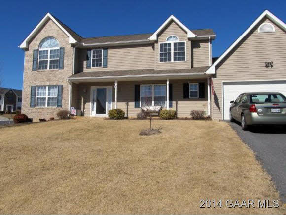 81 Sir Robin Road Waynesboro, VA 22980 - Photo 3 of 25 a view of a white house with large windows and a street