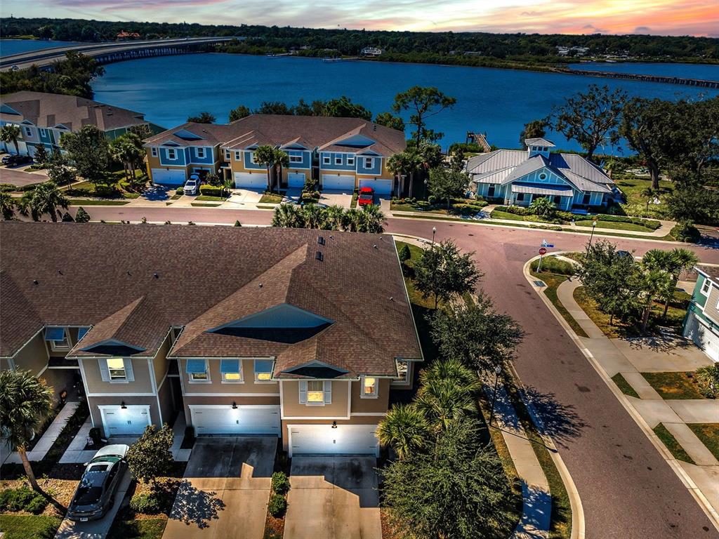 a view of multiple houses with a yard