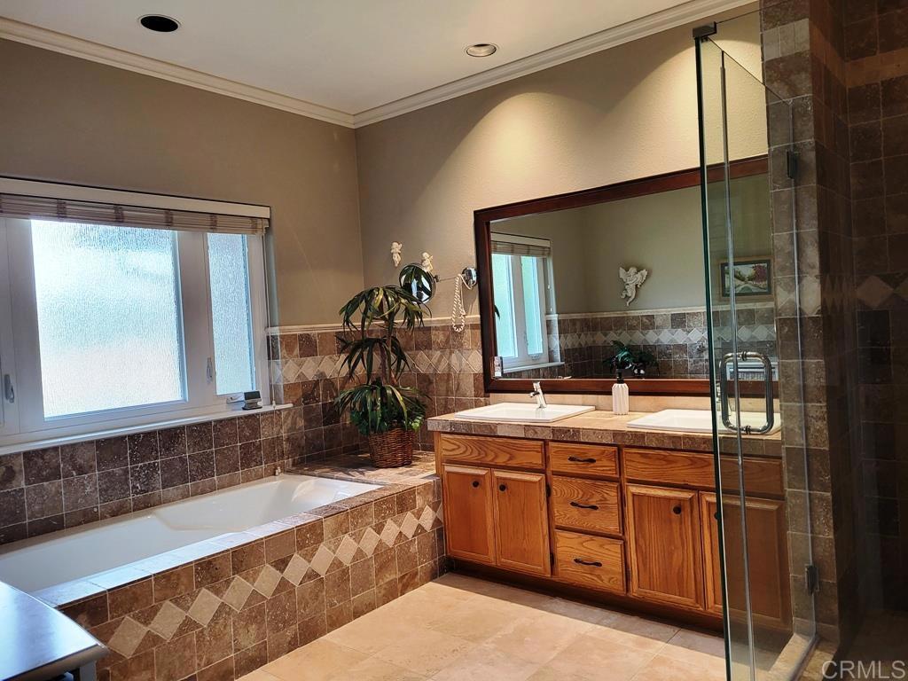 1879 Fox Bridge Court Fallbrook, CA 92028 - Photo 11 of 29 Master Bath with Tub and Walk In Shower