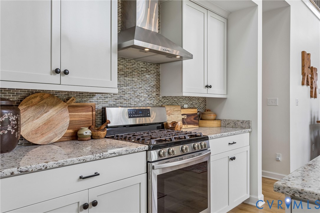 2016 Forge Road Toano, VA 23168 - Photo 57 of 99 Stainless steel gas range with a coordinating stai