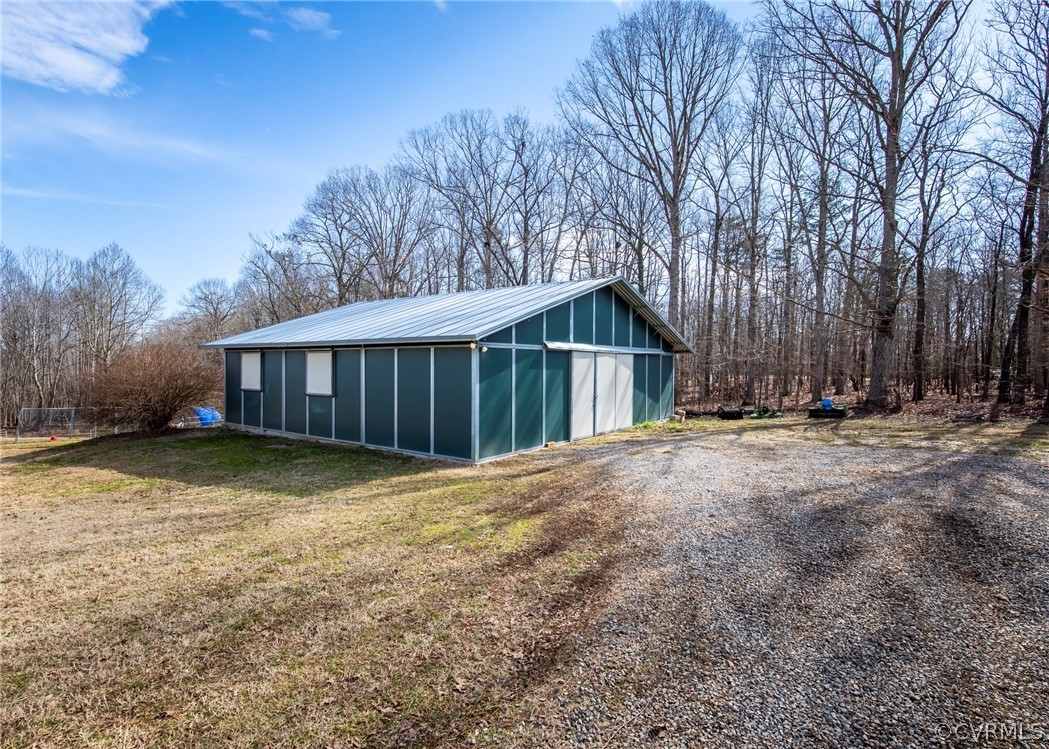 1210 Schroeder Road Powhatan, VA 23139 - Photo 32 of 50 MD BARNMASTER BARN ON CONCRETE PAD WITH 4 12X12 ST