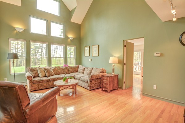 149 Nourse Road Bolton, MA 01740 - Photo 13 of 30 a living room with furniture and a large window