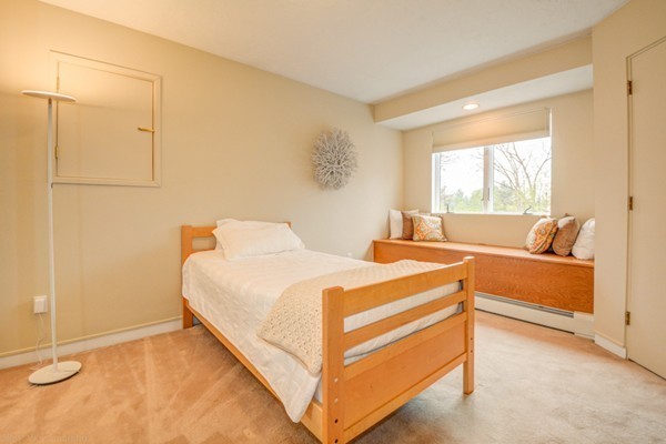 149 Nourse Road Bolton, MA 01740 - Photo 19 of 30 a bedroom with a bed and a cabinets