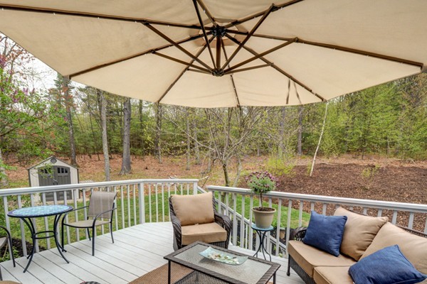 149 Nourse Road Bolton, MA 01740 - Photo 26 of 30 a view of sitting area with furniture and wooden deck