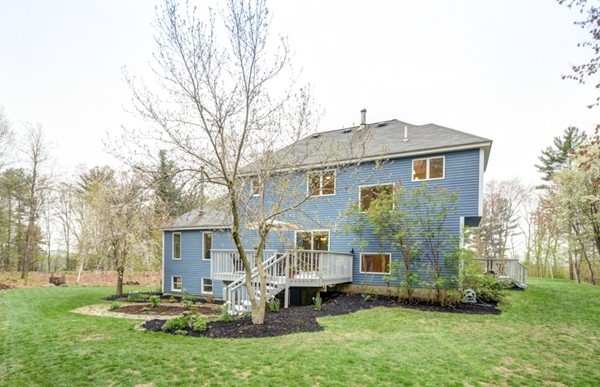 149 Nourse Road Bolton, MA 01740 - Photo 27 of 30 a front view of a house with a yard