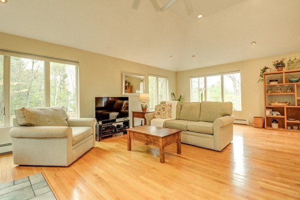 149 Nourse Road Bolton, MA 01740 - Photo 7 of 30 a living room with furniture and large windows