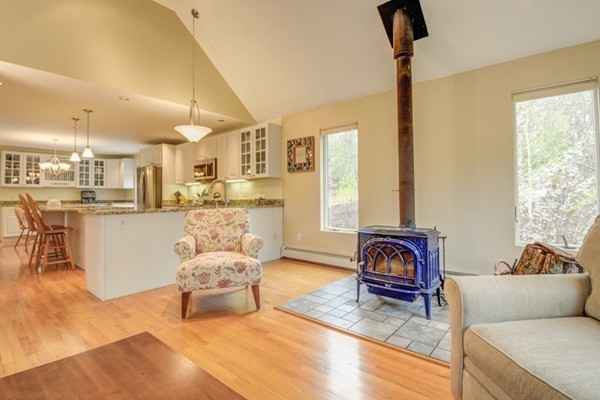 149 Nourse Road Bolton, MA 01740 - Photo 8 of 30 a living room with furniture and a large window