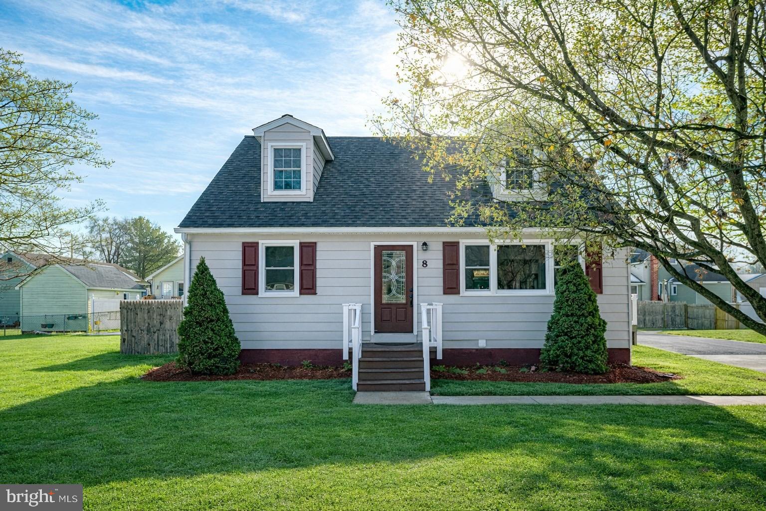 8 Riviera Drive Pennsville, NJ 08070 - Photo 2 of 31 a front view of a house with a yard