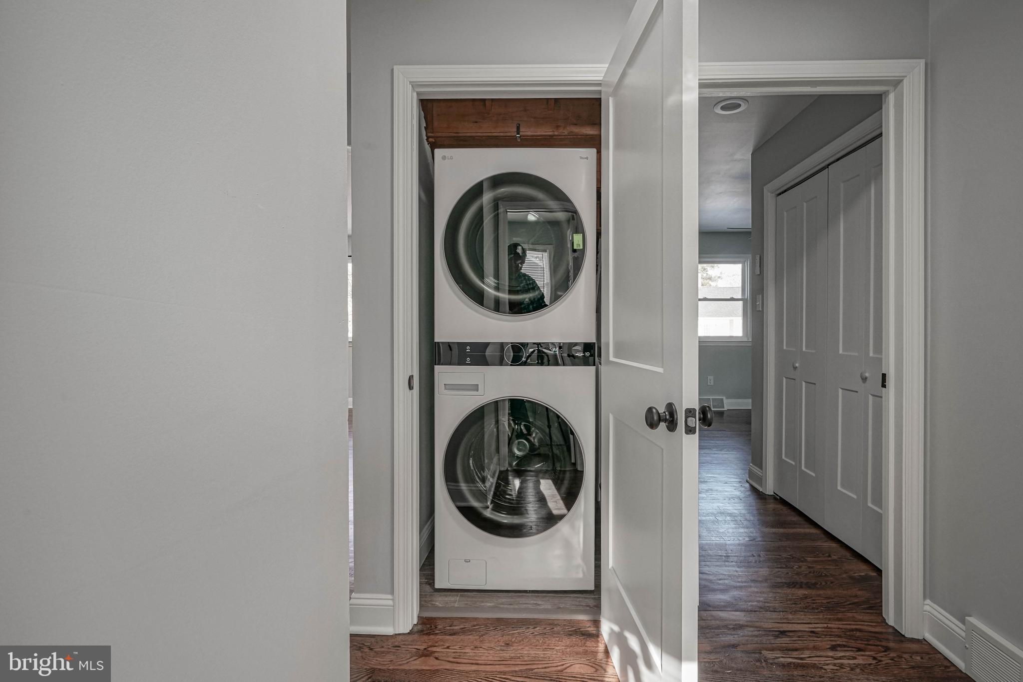8 Riviera Drive Pennsville, NJ 08070 - Photo 24 of 31 a view of a hallway with washer and dryer