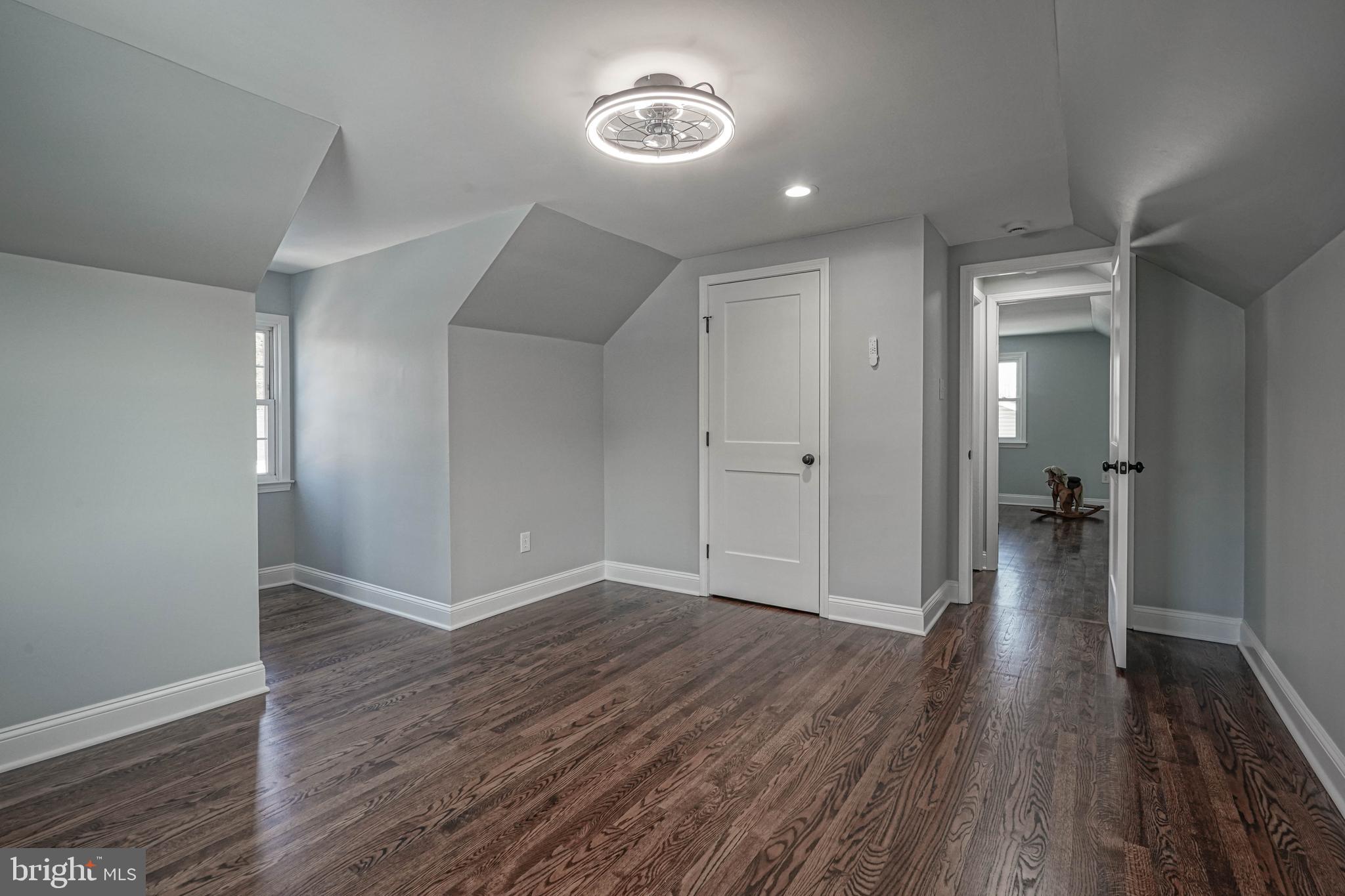 8 Riviera Drive Pennsville, NJ 08070 - Photo 26 of 31 wooden floor in an empty room with a window