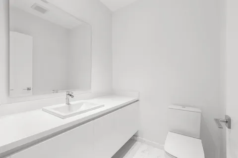 a bathroom with a sink and a toilet