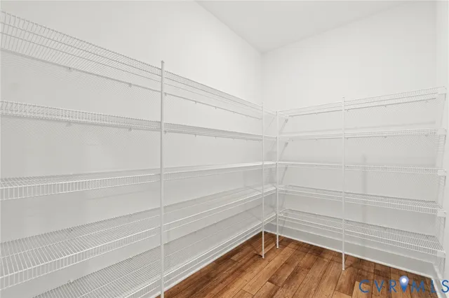 a bathroom with a double vanity sink mirror and