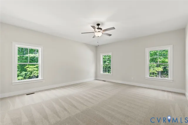 an empty room with windows