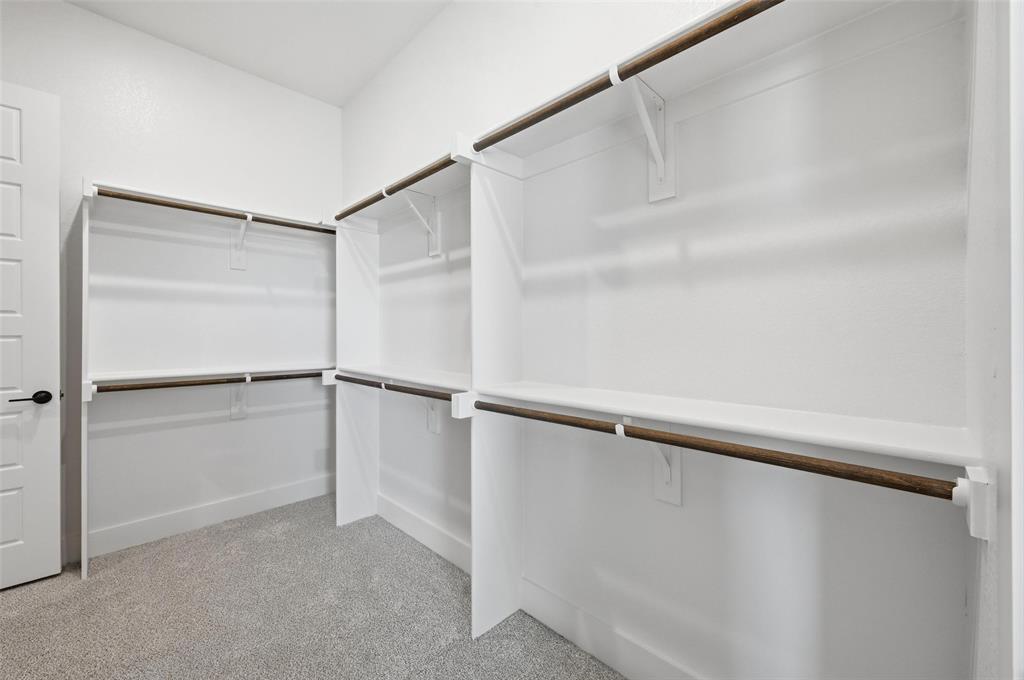 108 Rocky Top Azle, TX 76020 - Photo 29 of 40 a view of an empty walk in closet