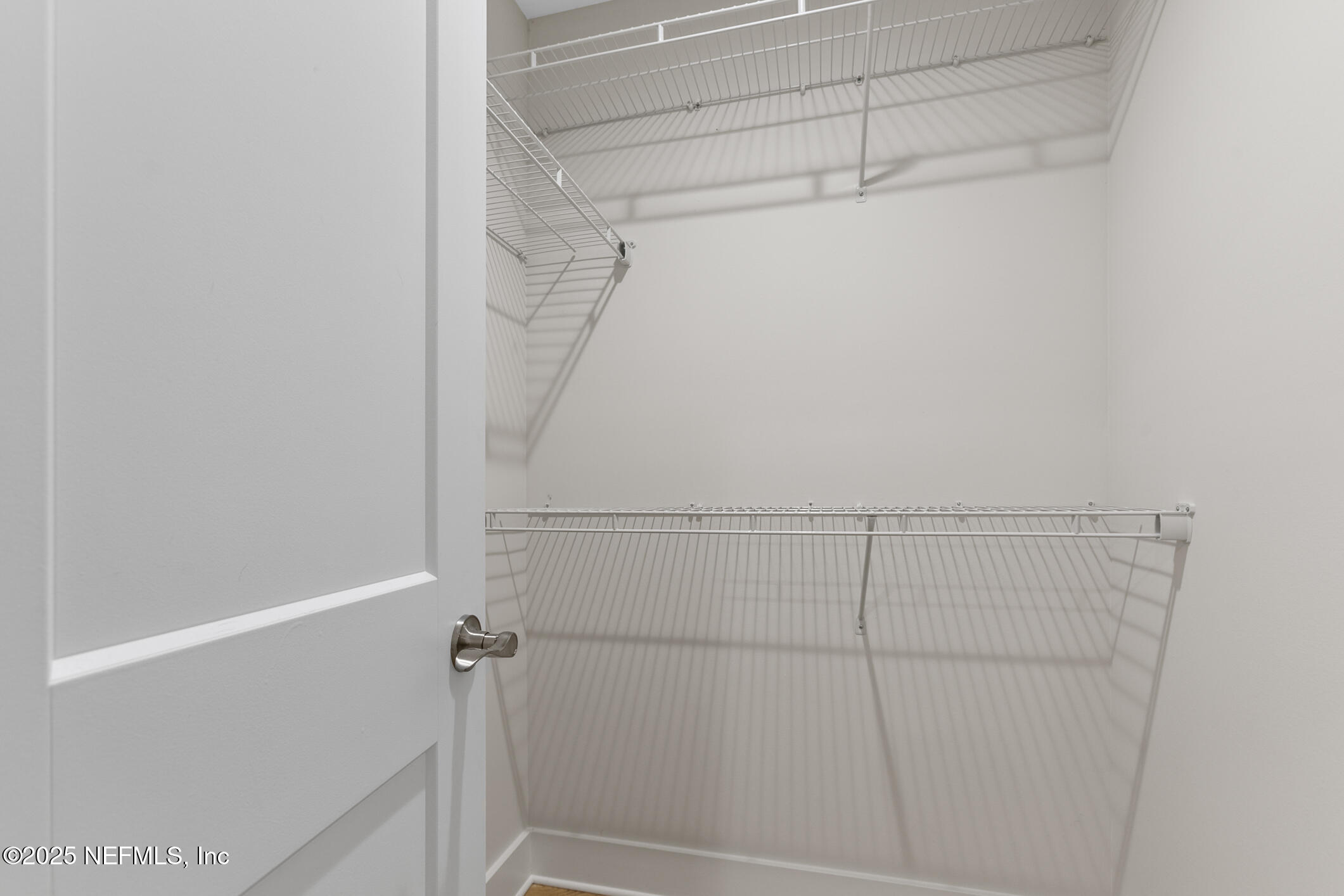 16 Sidney Street St. Augustine, FL 32084 - Photo 20 of 38 a view of a room with racks on the wall