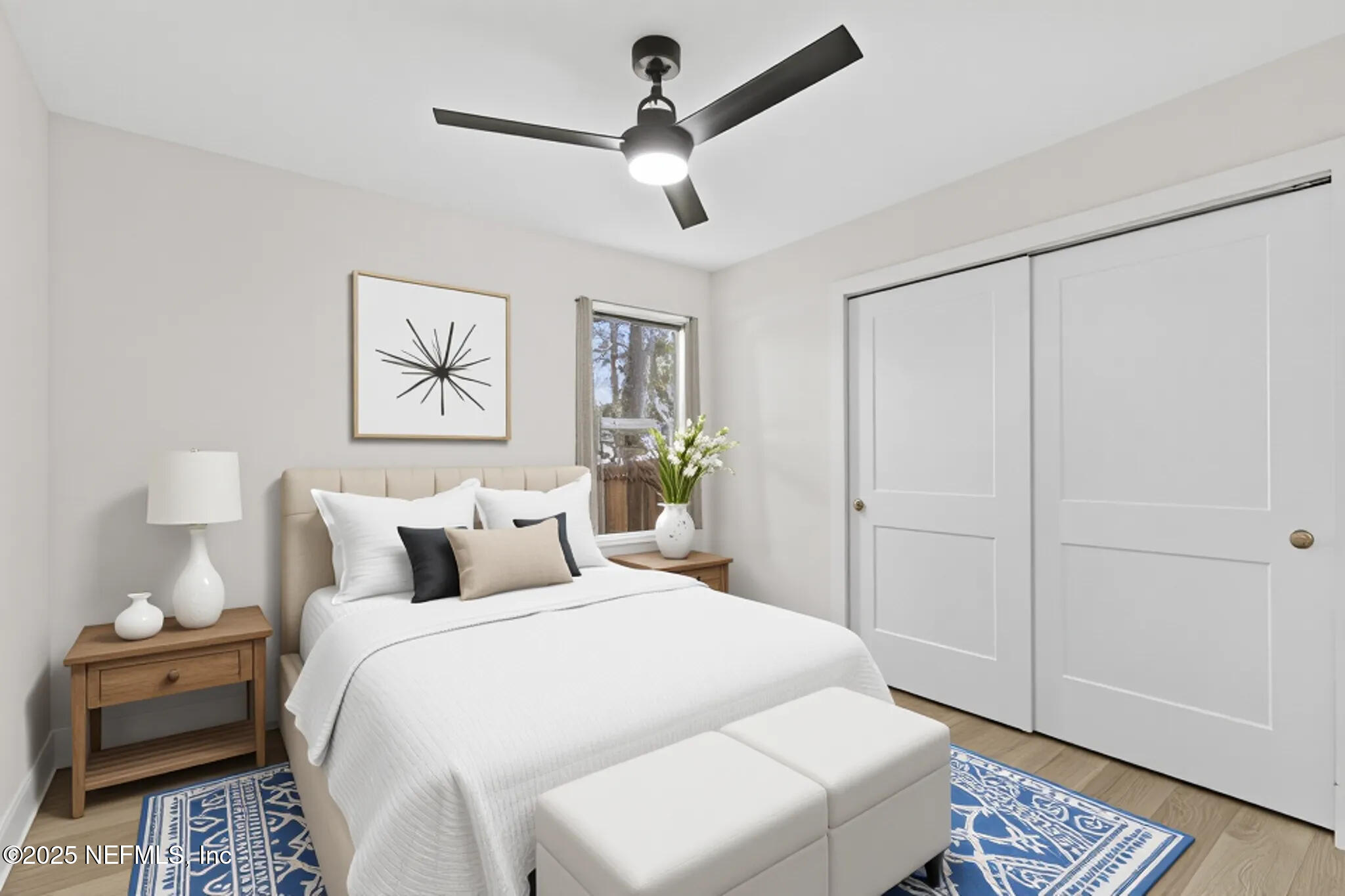 16 Sidney Street St. Augustine, FL 32084 - Photo 22 of 38 a bedroom with a bed and a painting on the wall