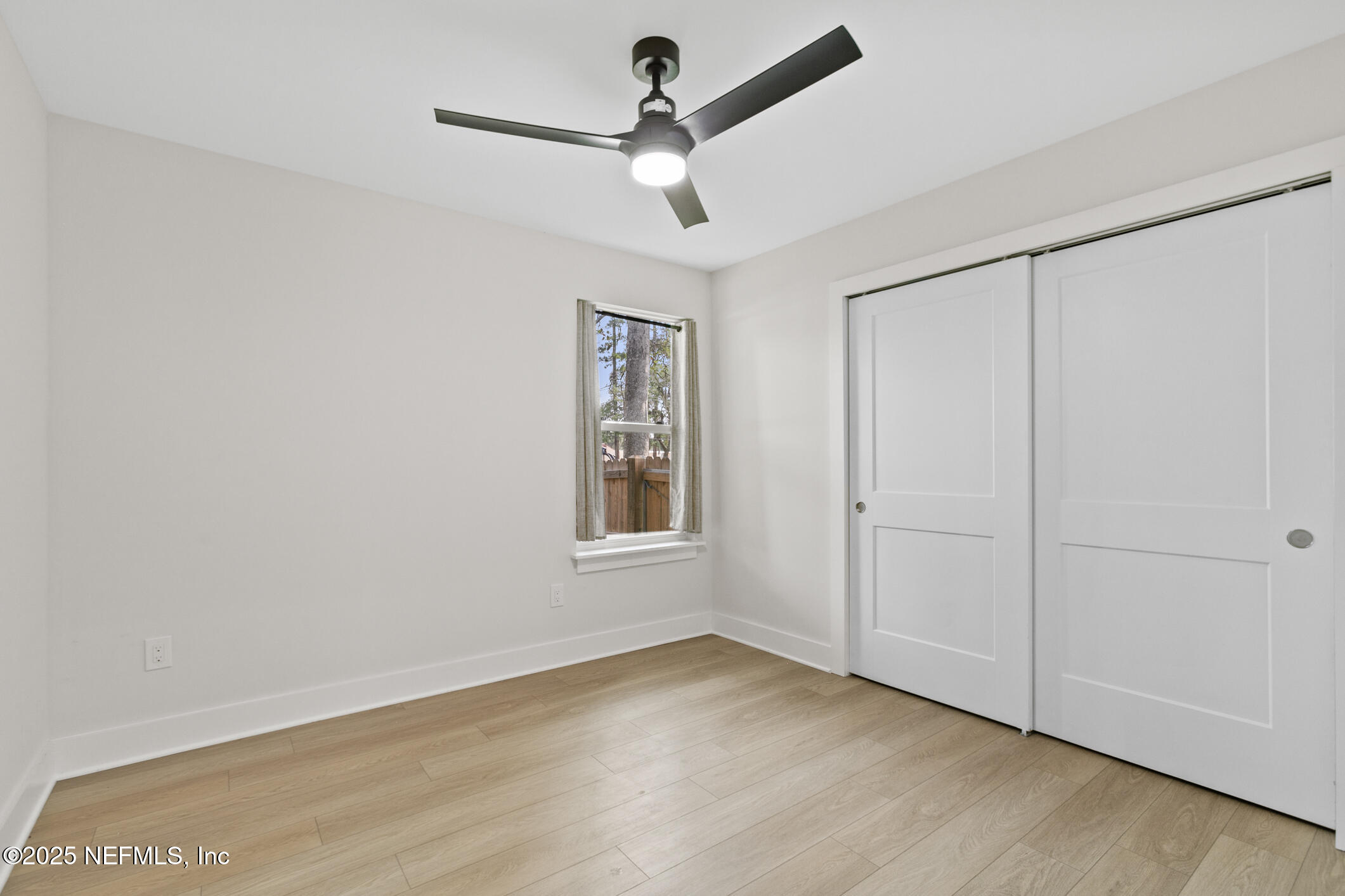 16 Sidney Street St. Augustine, FL 32084 - Photo 23 of 38 wooden floor in an empty room