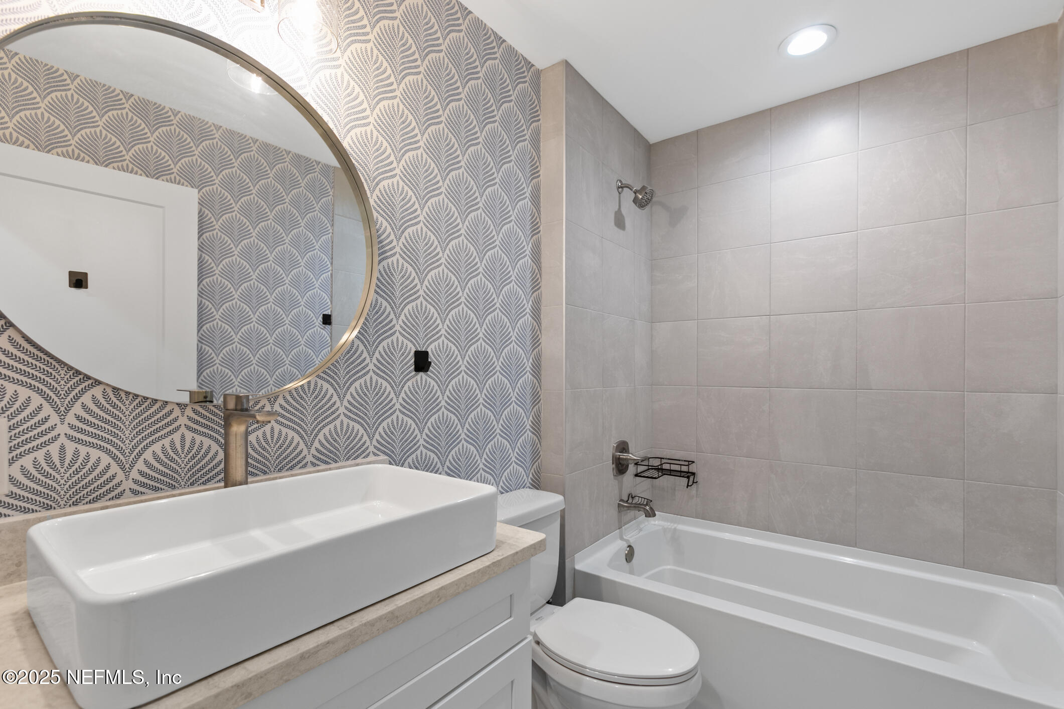 16 Sidney Street St. Augustine, FL 32084 - Photo 28 of 38 a bathroom with a sink a toilet and bathtub