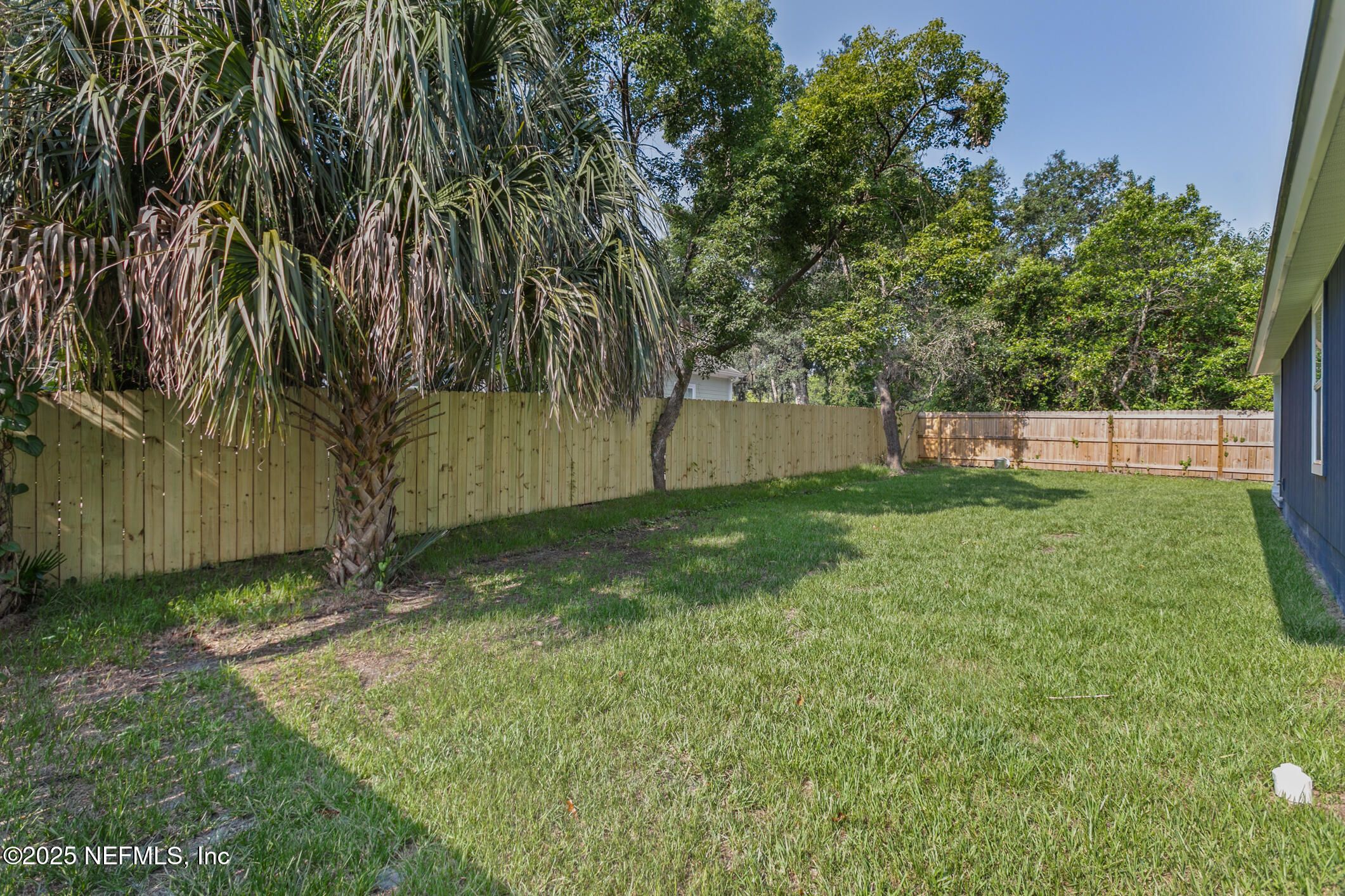 16 Sidney Street St. Augustine, FL 32084 - Photo 38 of 38 a view of a backyard with a garden