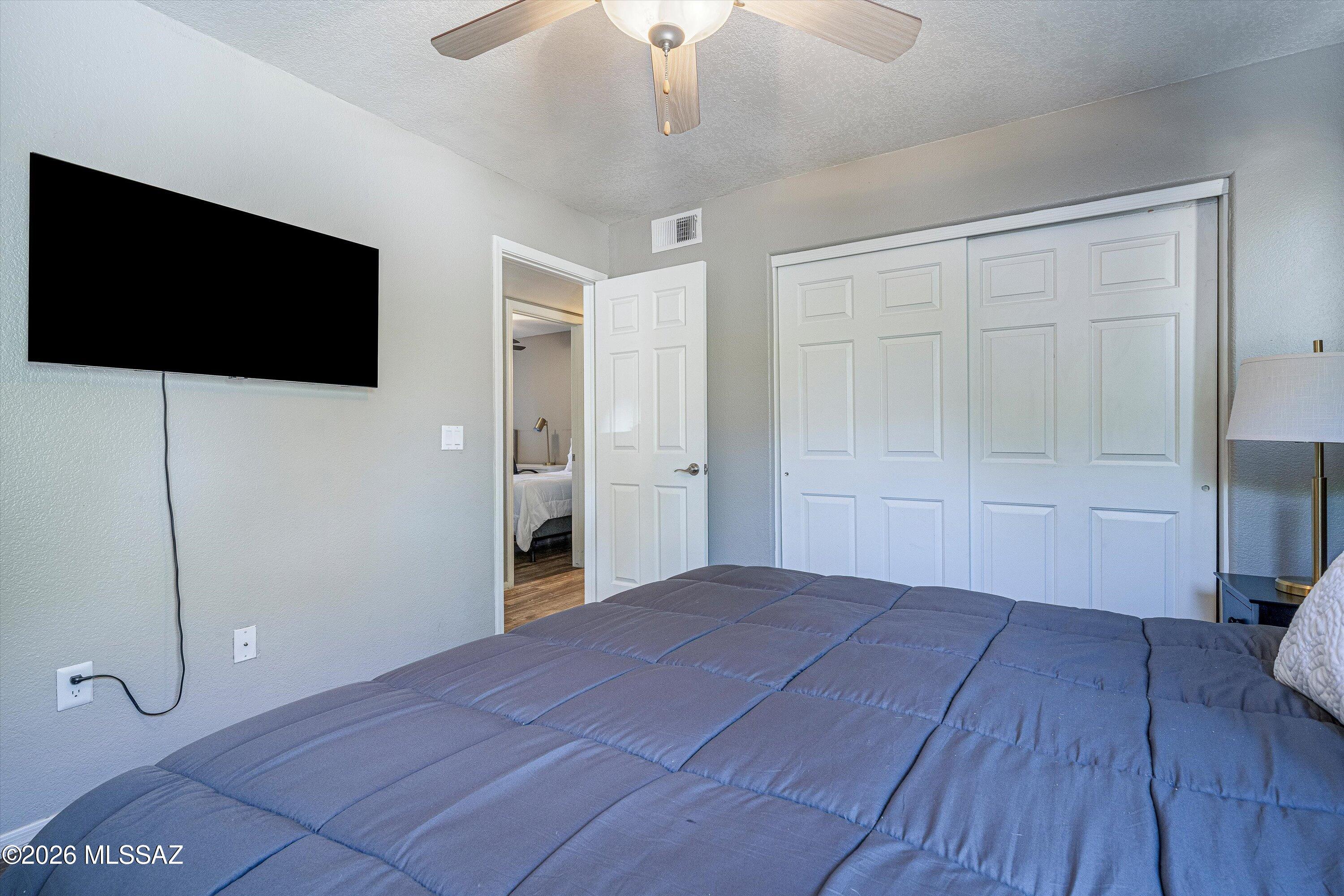 5855 North Kolb Road, Unit 8106 Tucson, AZ 85750 - Photo 12 of 34 a view of a livingroom with wooden floor