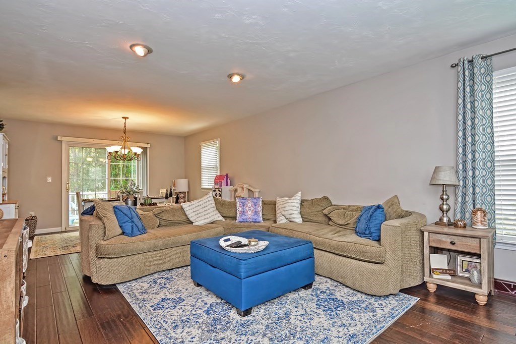 96 Danforth Street, Unit 19 Taunton, MA 02780 - Photo 12 of 31 a living room with furniture and a large window
