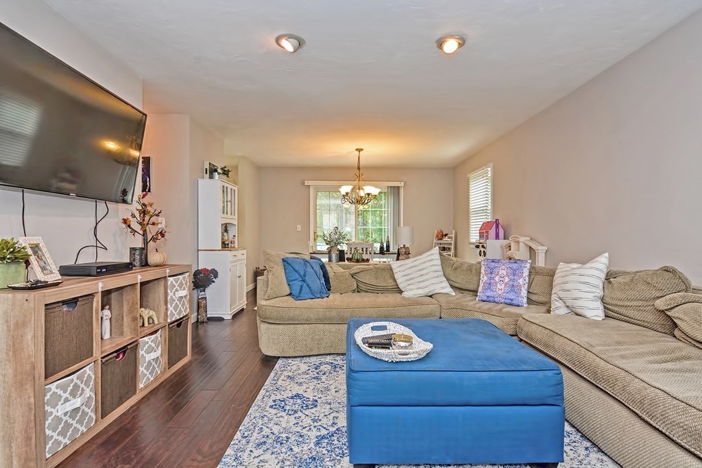 96 Danforth Street, Unit 19 Taunton, MA 02780 - Photo 13 of 31 a living room with furniture and a large window