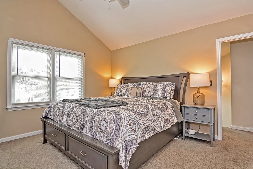 96 Danforth Street, Unit 19 Taunton, MA 02780 - Photo 16 of 31 a bedroom with a bed and window