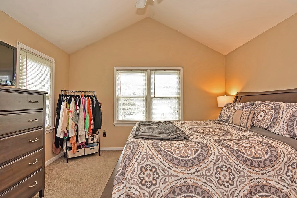 96 Danforth Street, Unit 19 Taunton, MA 02780 - Photo 17 of 31 a bedroom with a bed and a window