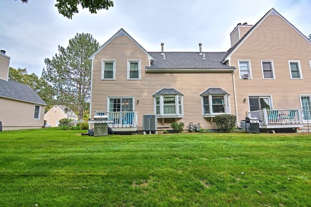 96 Danforth Street, Unit 19 Taunton, MA 02780 - Photo 24 of 31 a view of a house with a yard