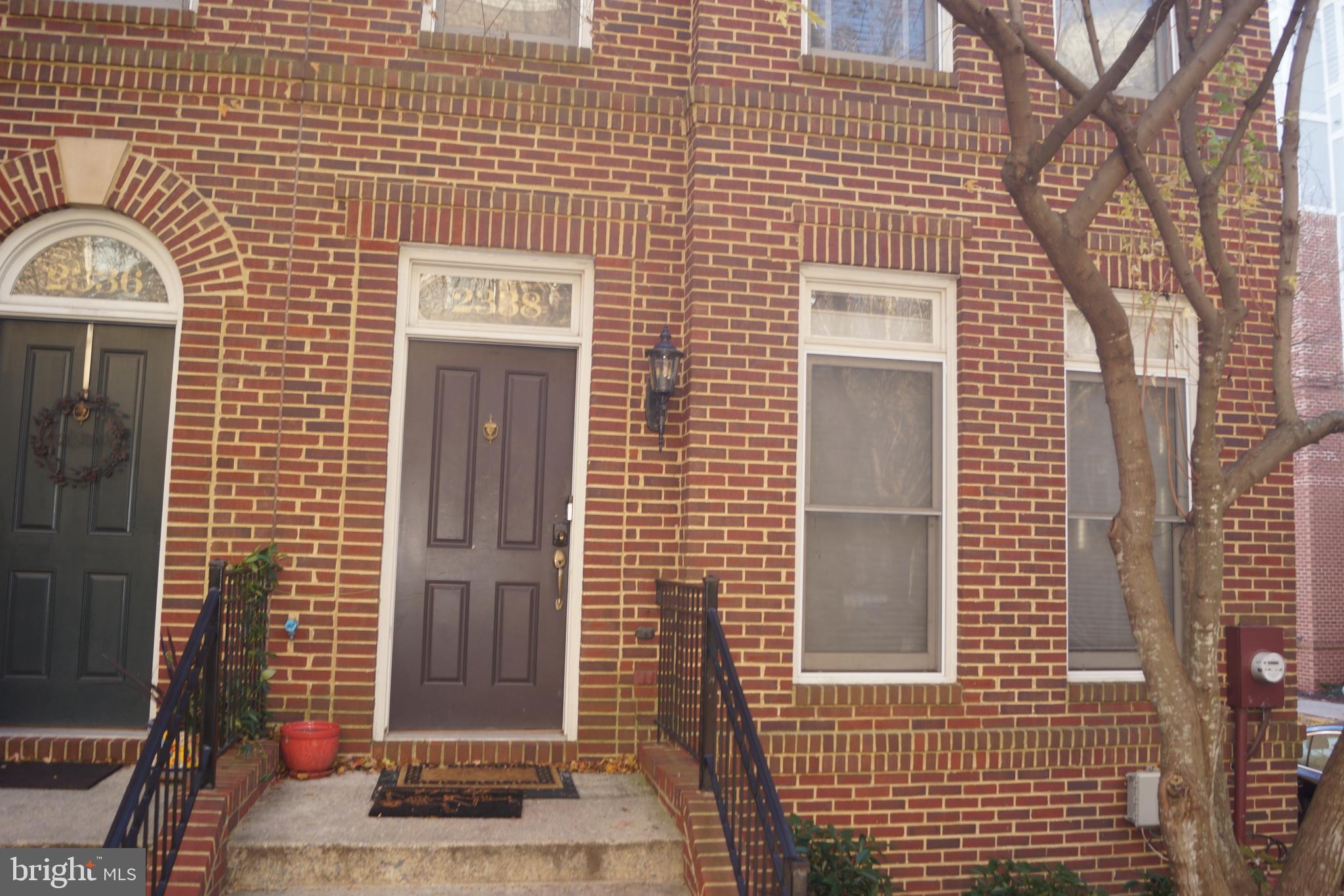 2338 Cobble Hill Terrace Silver Spring, MD 20902 - Photo 1 of 25 a view of a brick house with a door