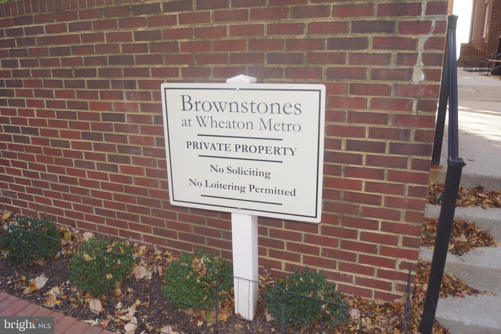 2338 Cobble Hill Terrace Silver Spring, MD 20902 - Photo 25 of 25 a sign on the brick wall