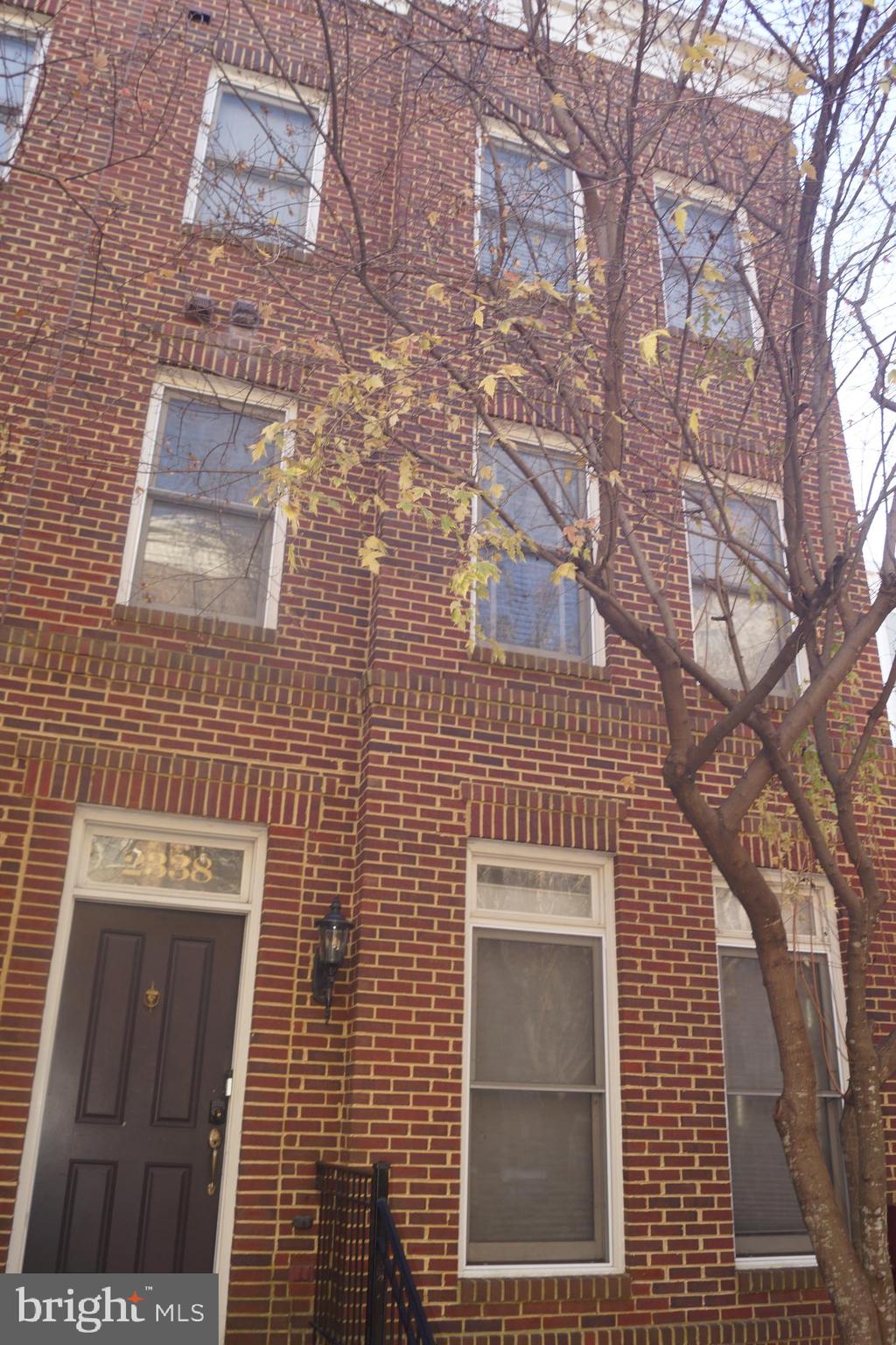 2338 Cobble Hill Terrace Silver Spring, MD 20902 - Photo 5 of 25 a building with a door and a window