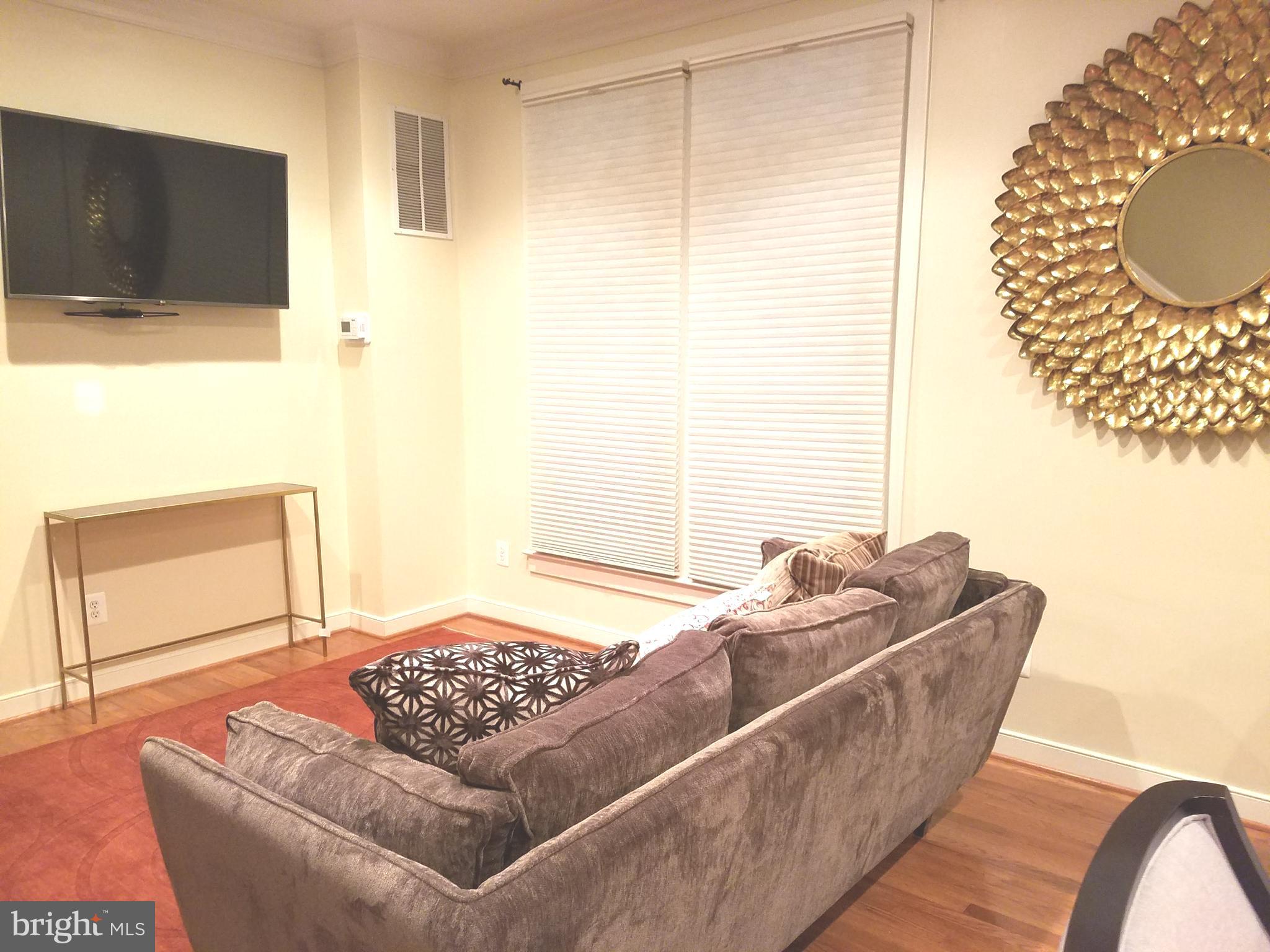 2338 Cobble Hill Terrace Silver Spring, MD 20902 - Photo 8 of 25 a living room with furniture and a window