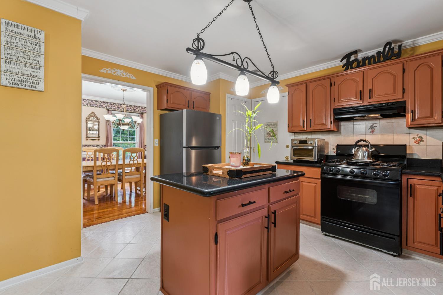 66 Spring Hill Road Old Bridge, NJ 07747 - Photo 1 of 32 a kitchen with stainless steel appliances granite countertop a stove and a sink