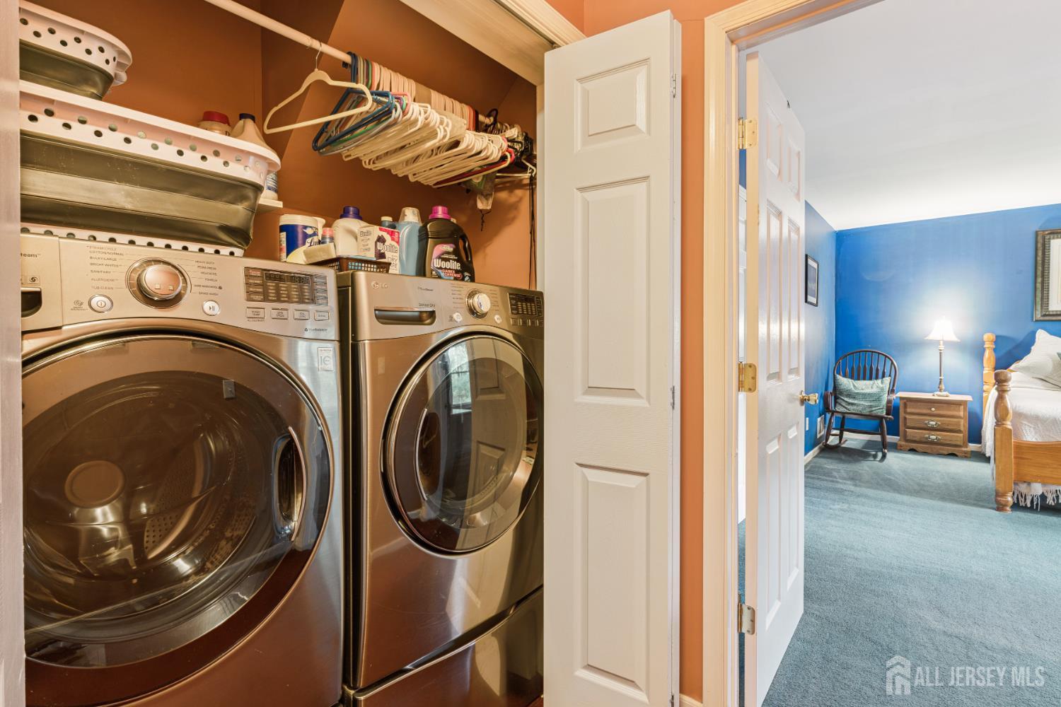 66 Spring Hill Road Old Bridge, NJ 07747 - Photo 26 of 32 a utility room with dryer and washer