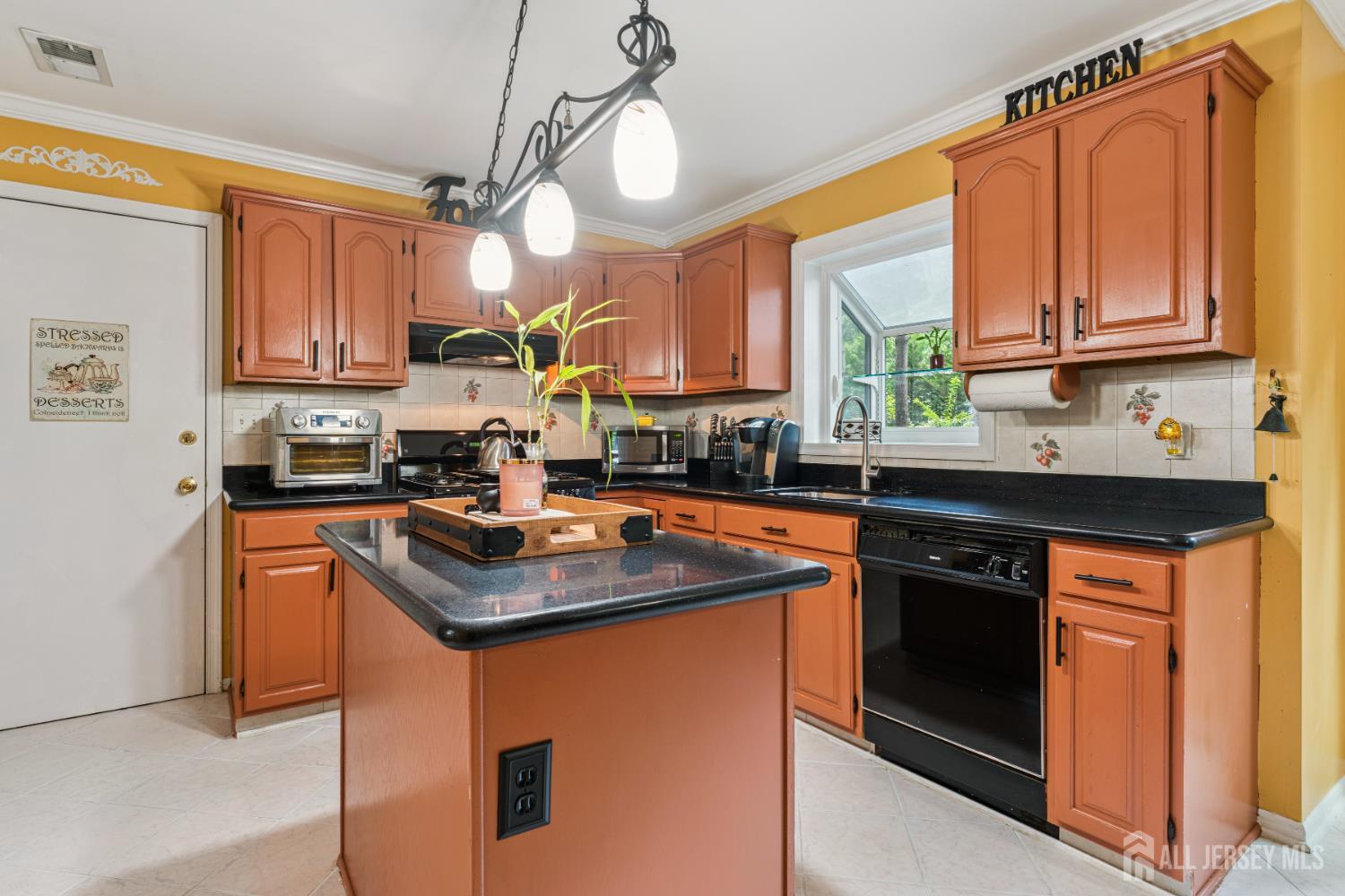 66 Spring Hill Road Old Bridge, NJ 07747 - Photo 3 of 32 a kitchen with stainless steel appliances granite countertop a sink stove and refrigerator