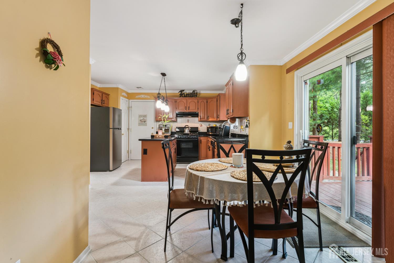 66 Spring Hill Road Old Bridge, NJ 07747 - Photo 6 of 32 a dining room with furniture and window