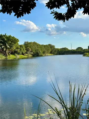 a view of a lake from a balcony