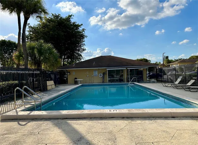 a front view of a house with yard