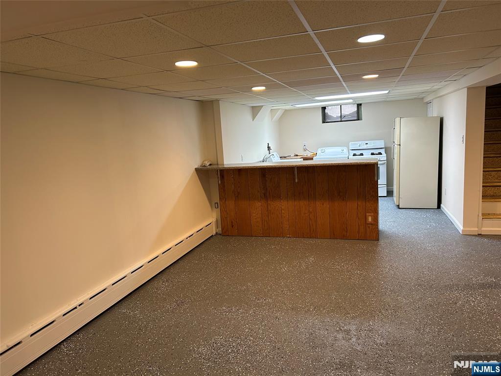 10-11 Alexander Avenue Fair Lawn, NJ 07410 - Photo 15 of 19 a view of kitchen and kitchen with granite countertop