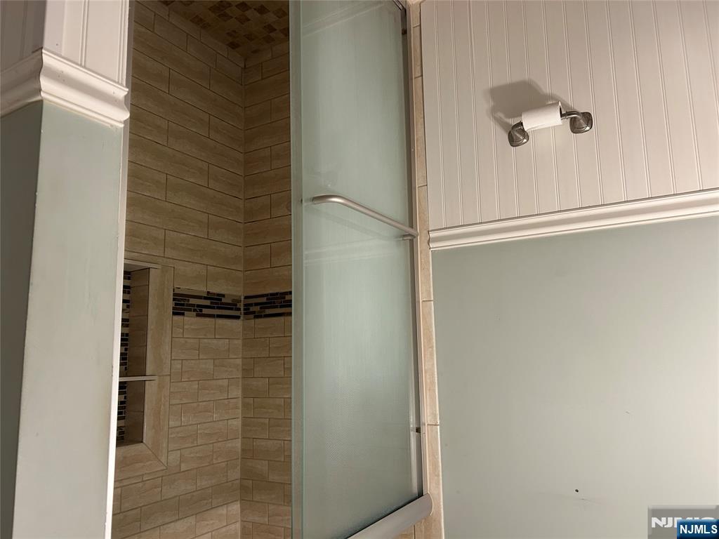 10-11 Alexander Avenue Fair Lawn, NJ 07410 - Photo 17 of 19 a bathroom with a shower