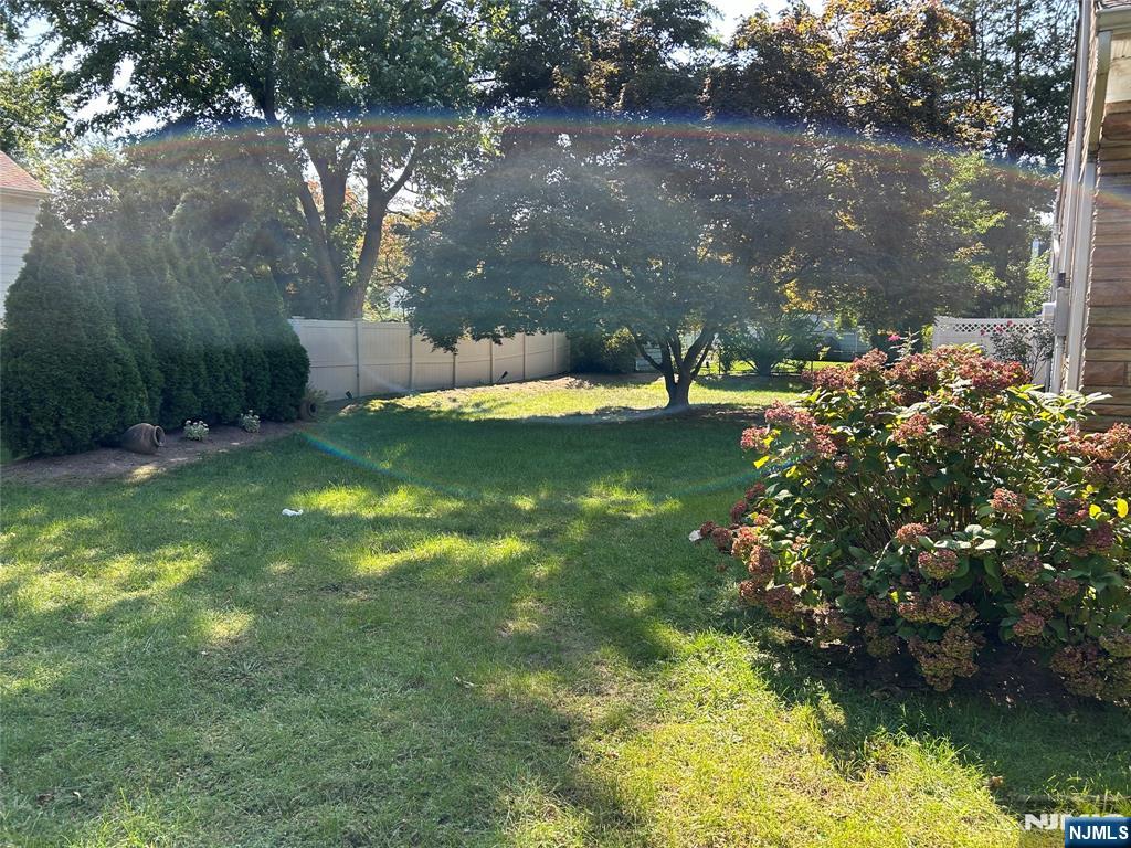 10-11 Alexander Avenue Fair Lawn, NJ 07410 - Photo 19 of 19 a view of yard with swimming pool